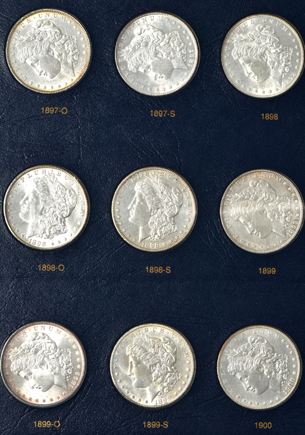 Collection of 34 different Morgan silver dollar in a Whitman Classic 9129 album