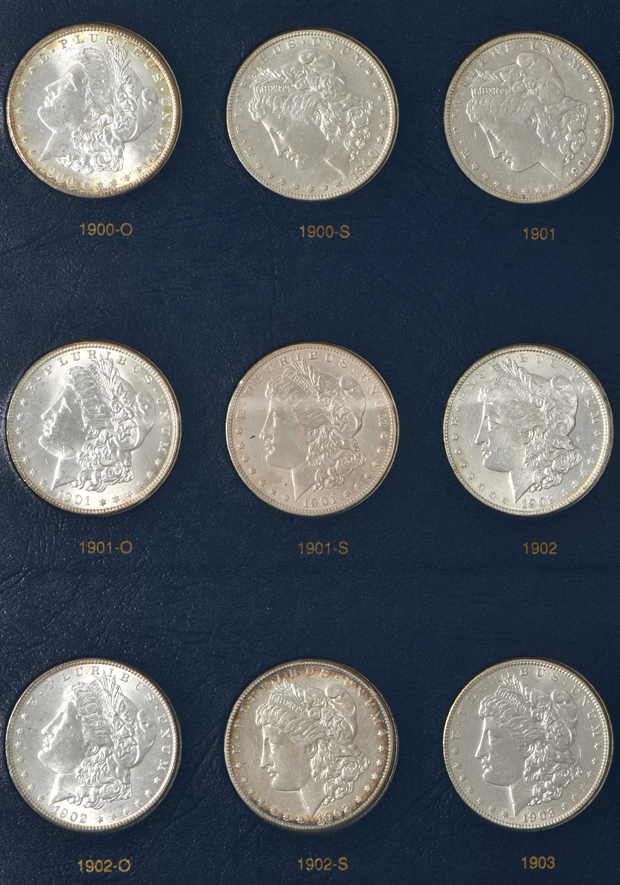 Collection of 34 different Morgan silver dollar in a Whitman Classic 9129 album