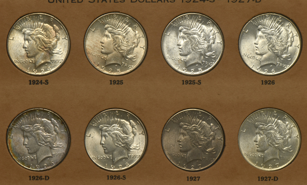 Complete collection of Peace silver dollars in a Wayte Raymond album