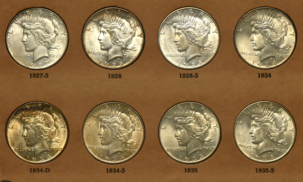 Complete collection of Peace silver dollars in a Wayte Raymond album