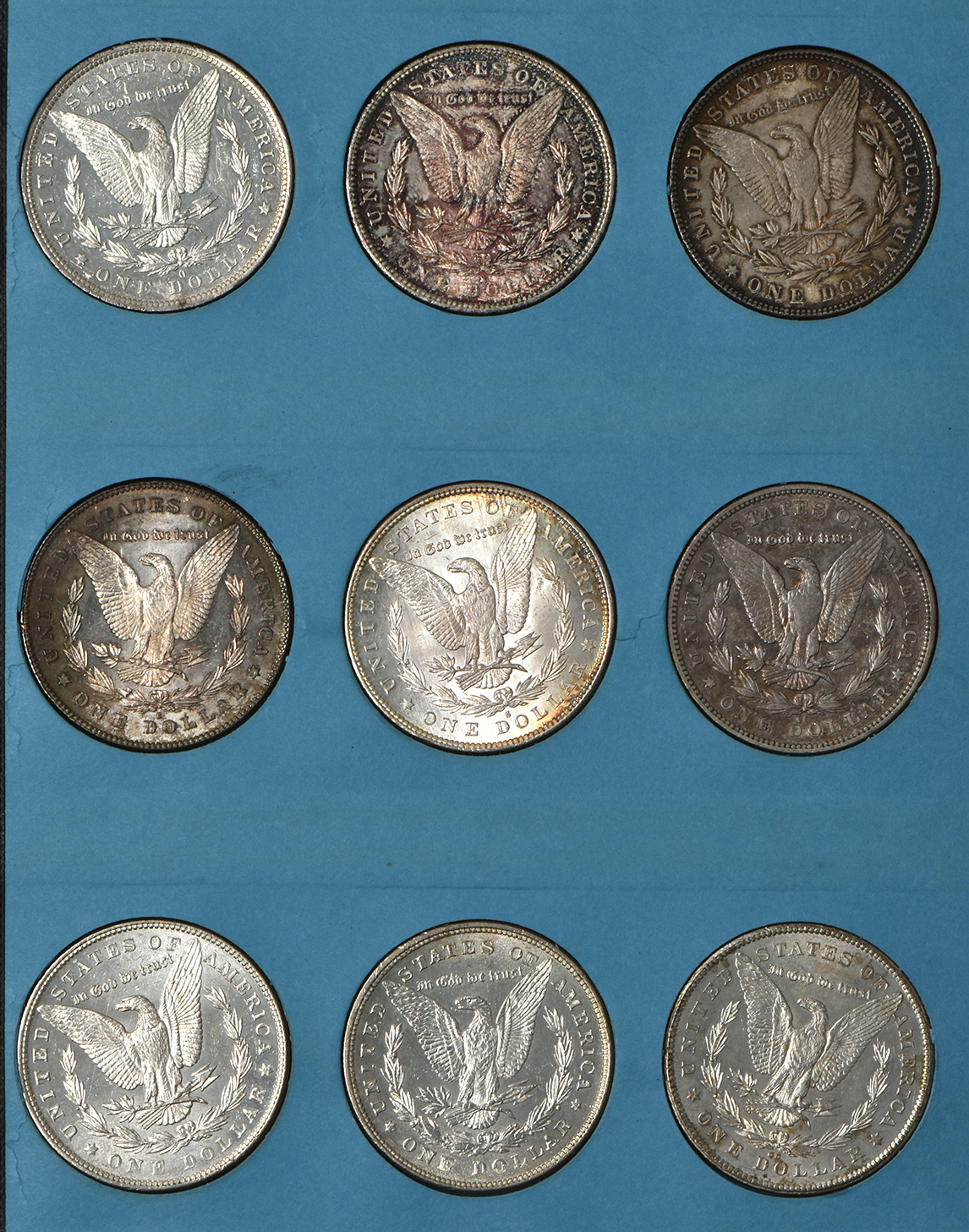 Collection of Morgan silver dollars, 1878 through 1884-O, in a Meghrig The "GEM" coin album