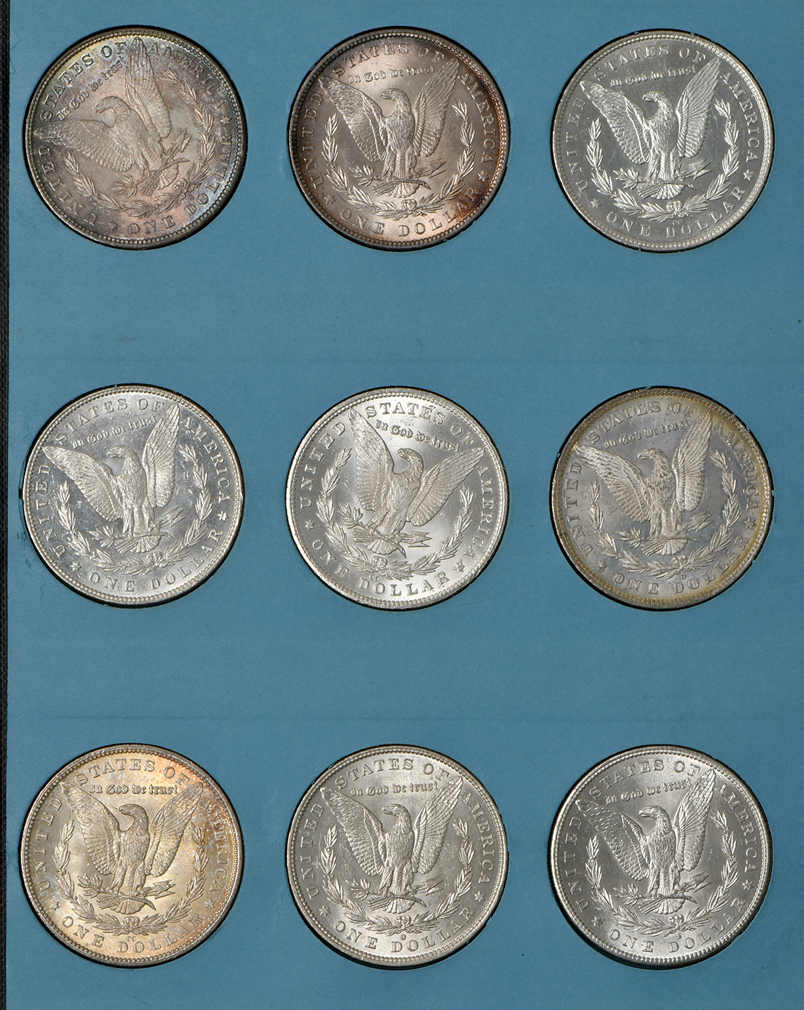 Collection of Morgan silver dollars, 1878 through 1884-O, in a Meghrig The "GEM" coin album