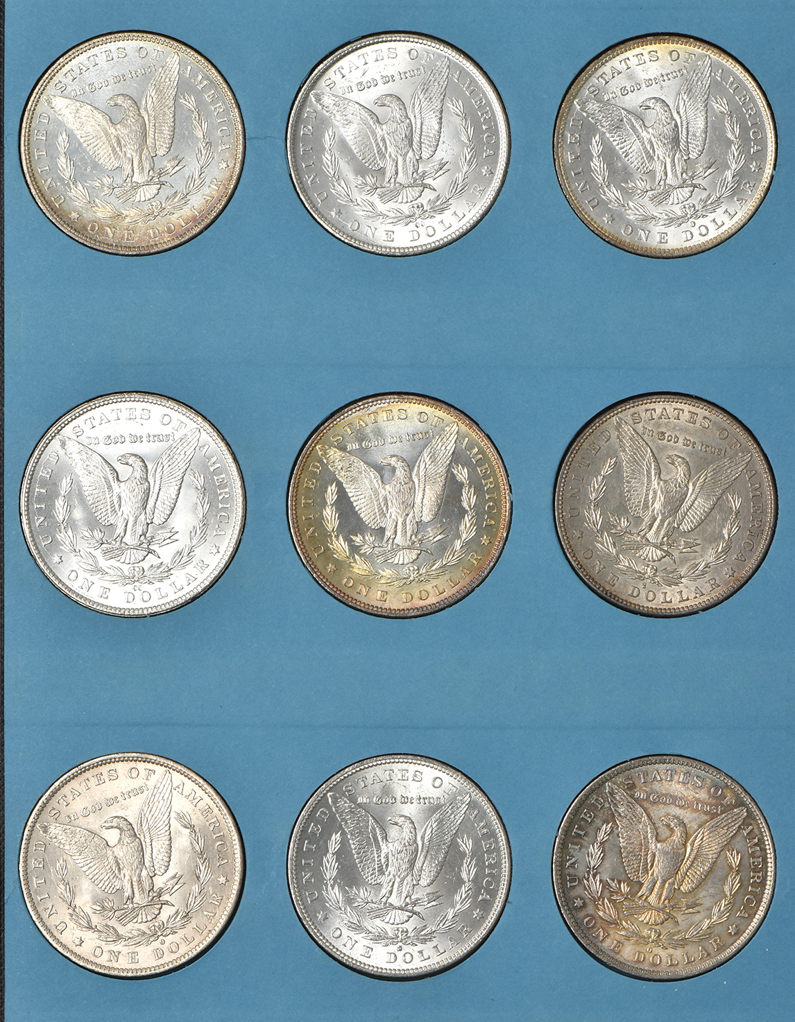 Collection of Morgan silver dollars, 1878 through 1884-O, in a Meghrig The "GEM" coin album
