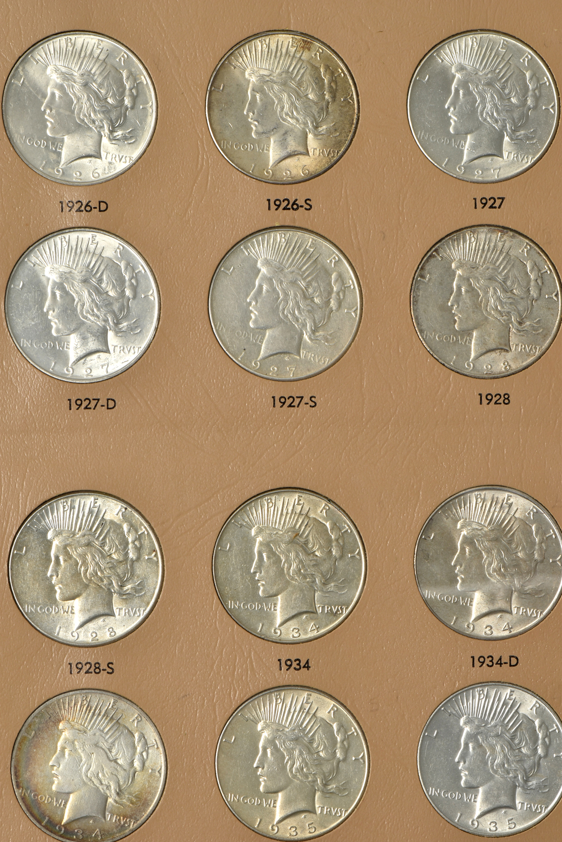 Complete collection of Peace silver dollars in a Dansco 7175 album