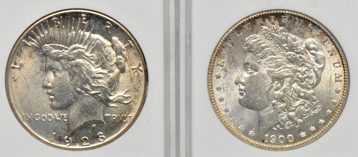 Three Morgan silver dollars and a Peace silver dollar, all ANACS (miniature)