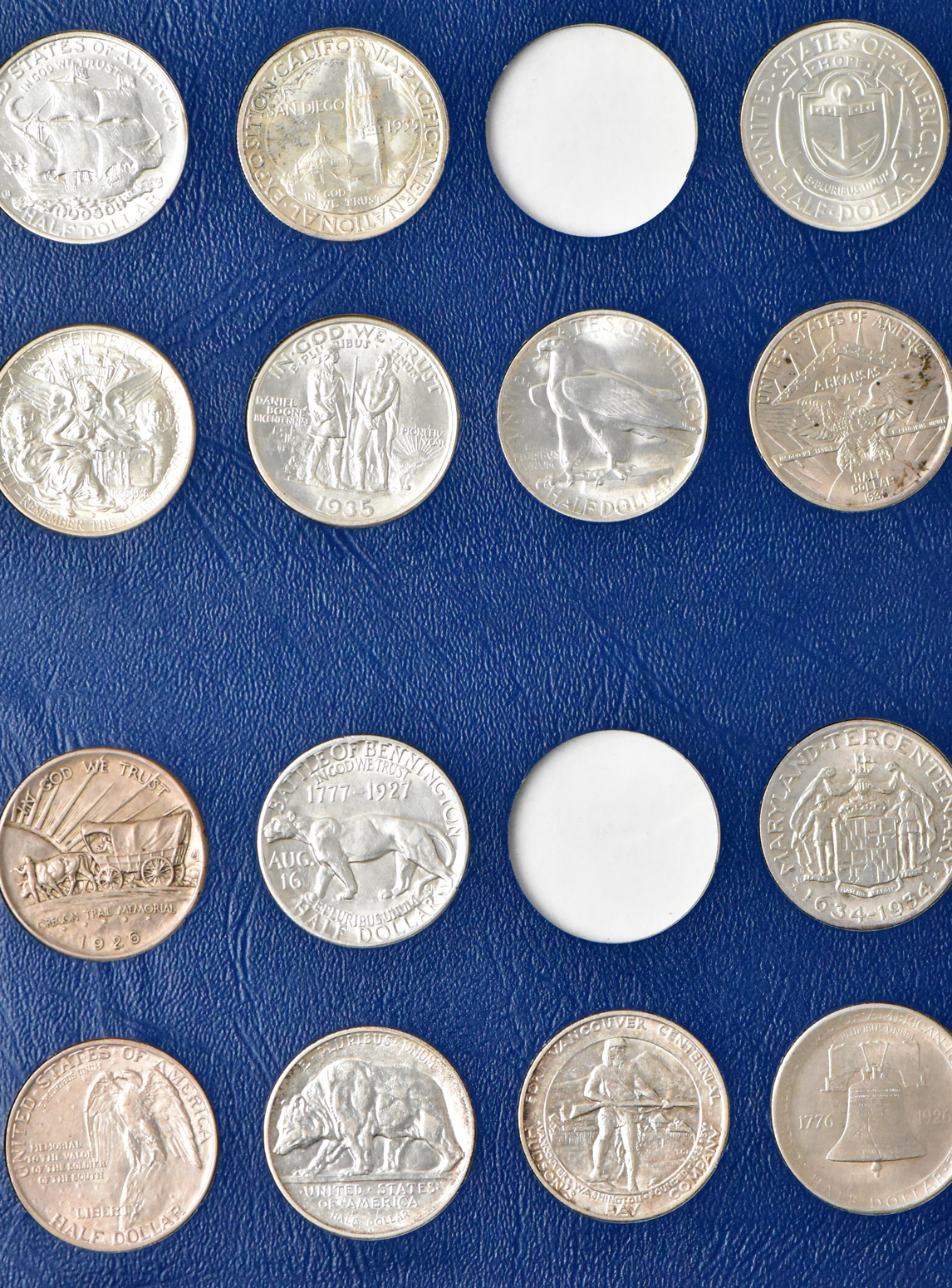 Collection of 48 different silver commemoratives in a nearly complete Whitman 9433 album