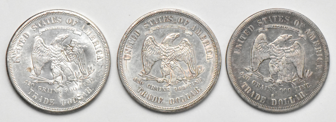 1875-S Trade, 1875-S Trade Chop Mark, and 1877-S, as described
