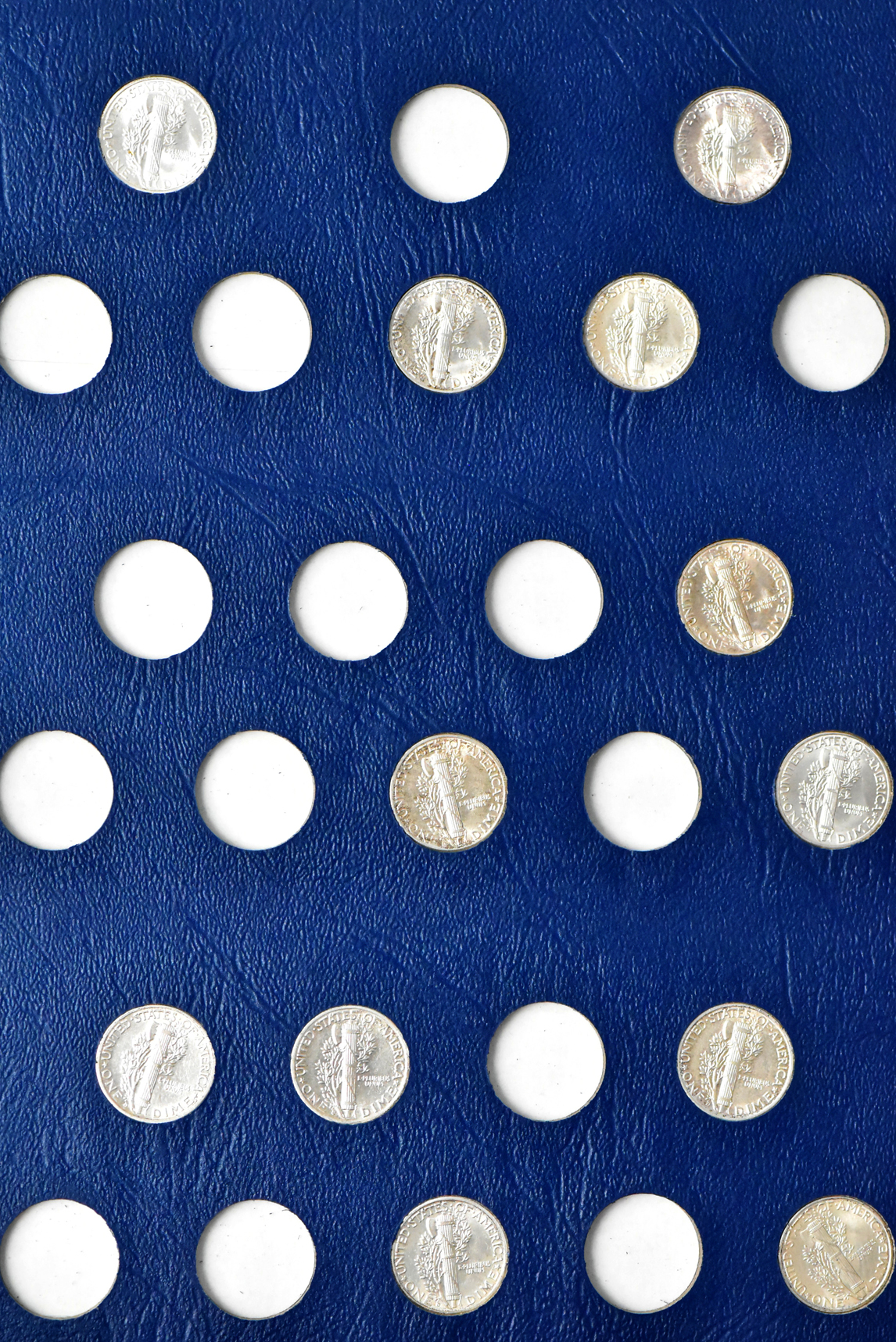 Collection of 55 different Mercury Dimes in a Whitman 9413 album