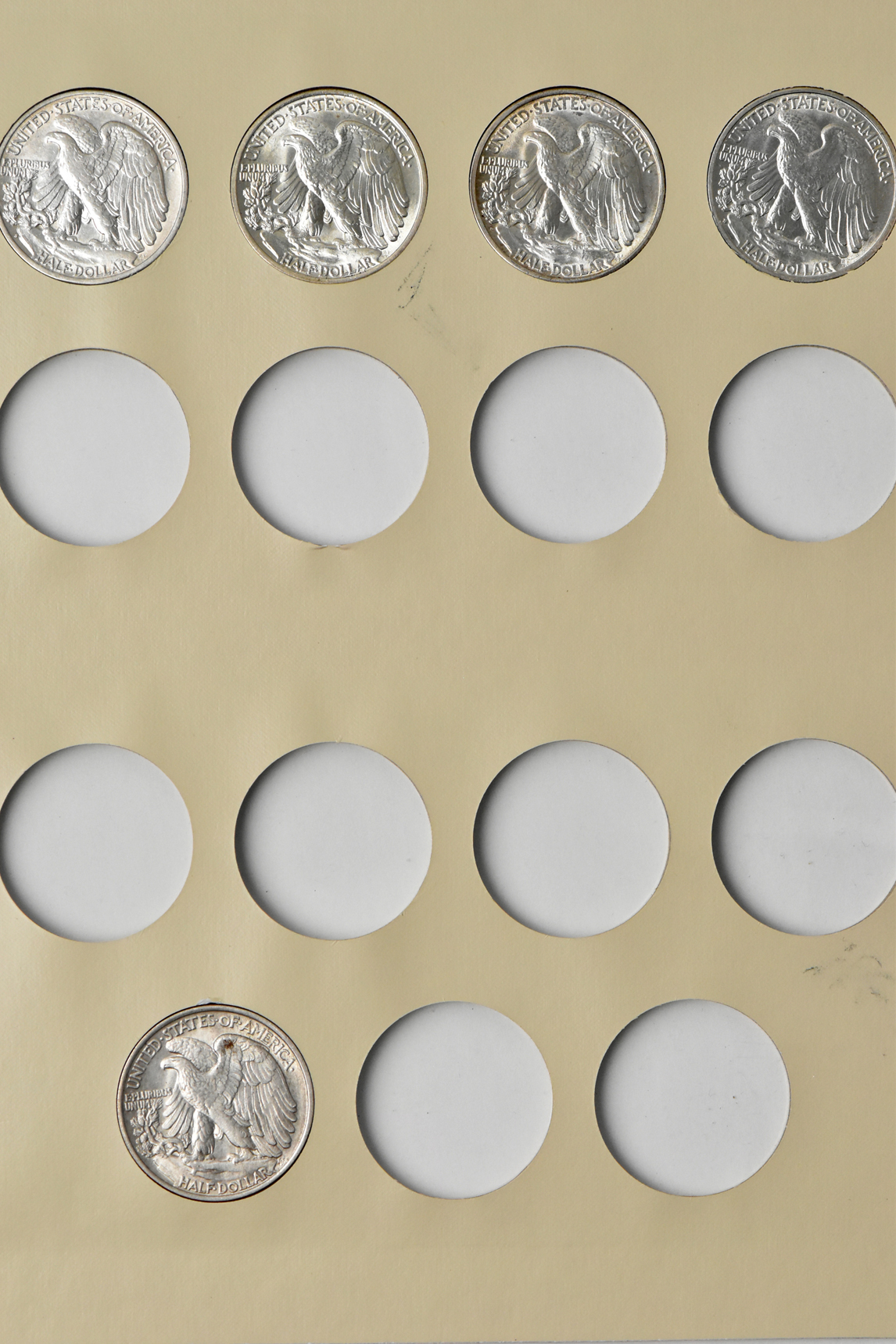 Collection of 42 Walking Liberty half-dollars in a Littleton album