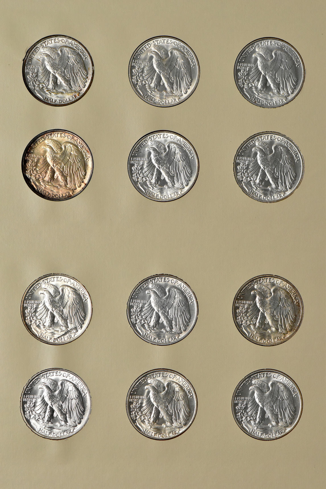 Collection of 42 Walking Liberty half-dollars in a Littleton album