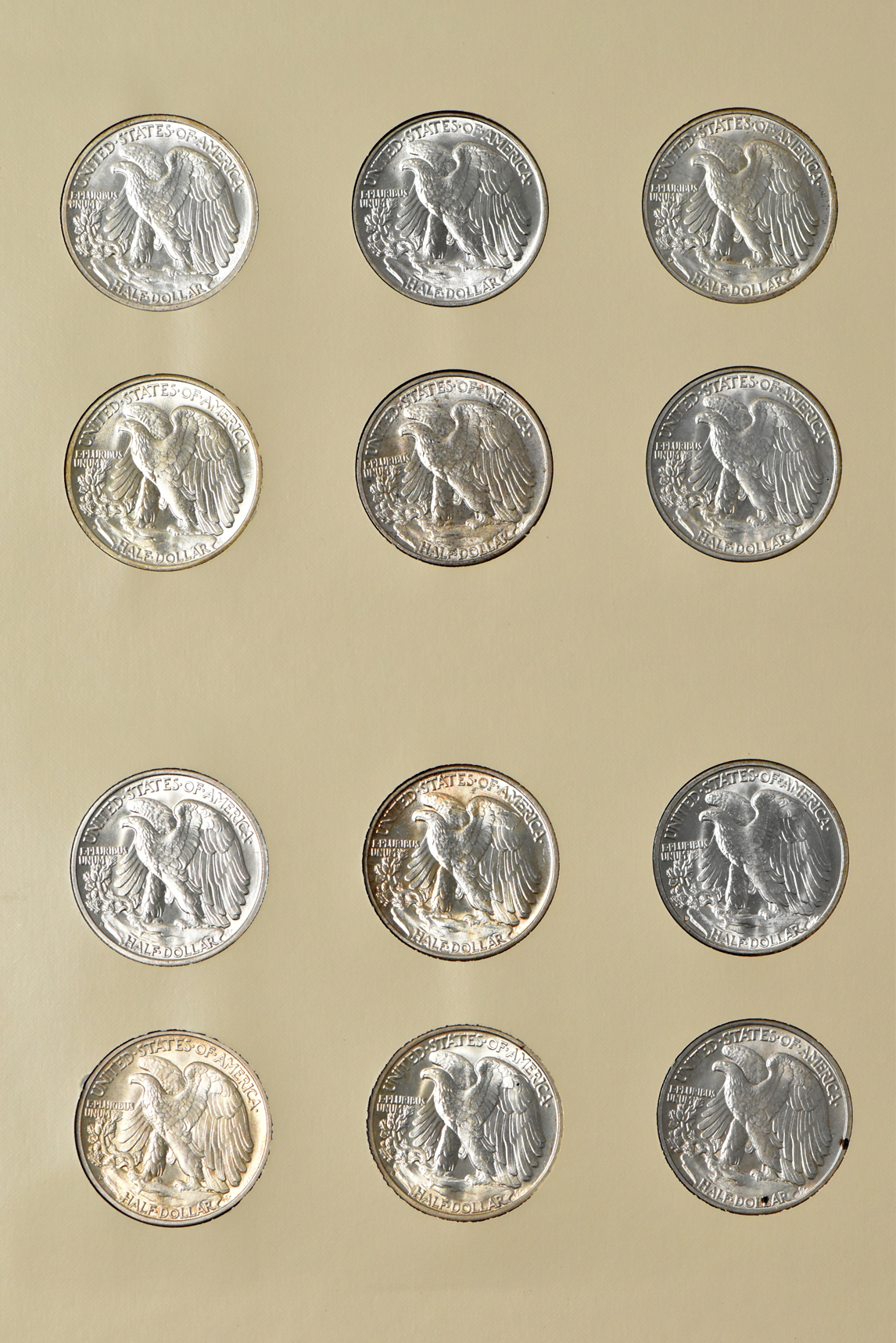 Collection of 42 Walking Liberty half-dollars in a Littleton album