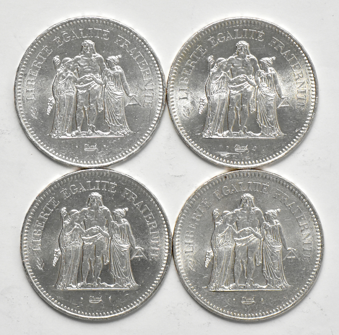 Multiple - Twenty-two 50 francs, plus 18 various silver coins