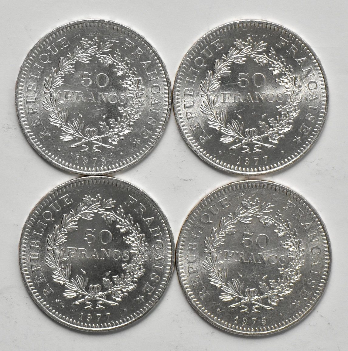 Multiple - Twenty-two 50 francs, plus 18 various silver coins