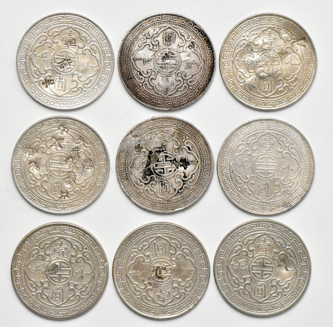 Great Britain - Thirteen chop marked trade dollars