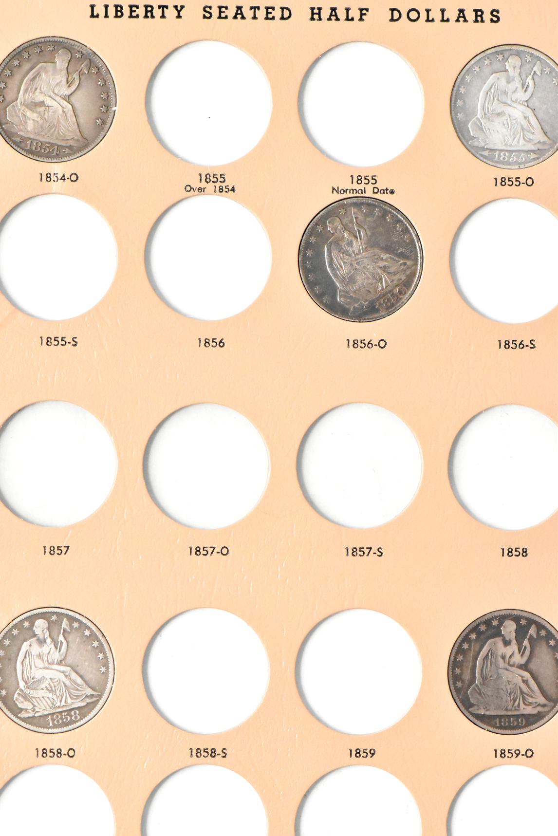 Collection of 32 different Liberty Seated half-dollars in a Dansco 6152 album