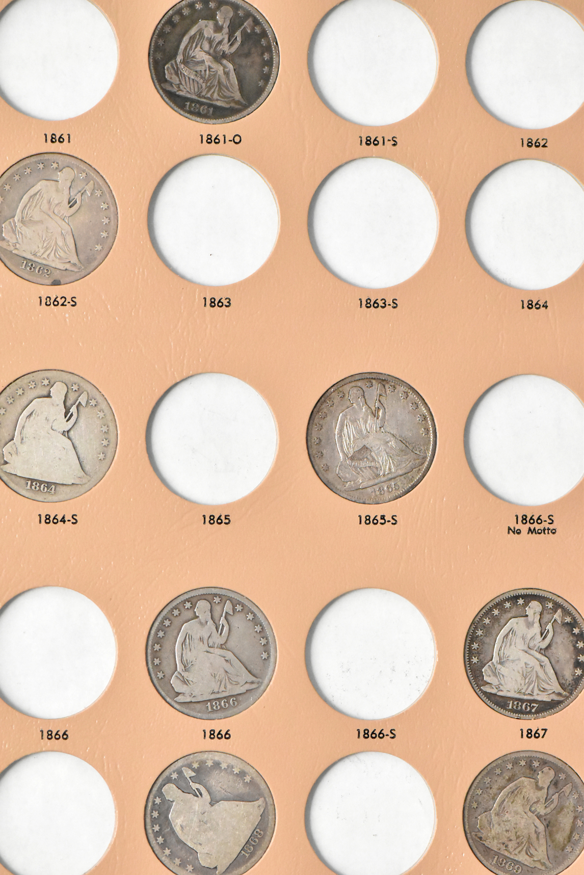 Collection of 32 different Liberty Seated half-dollars in a Dansco 6152 album
