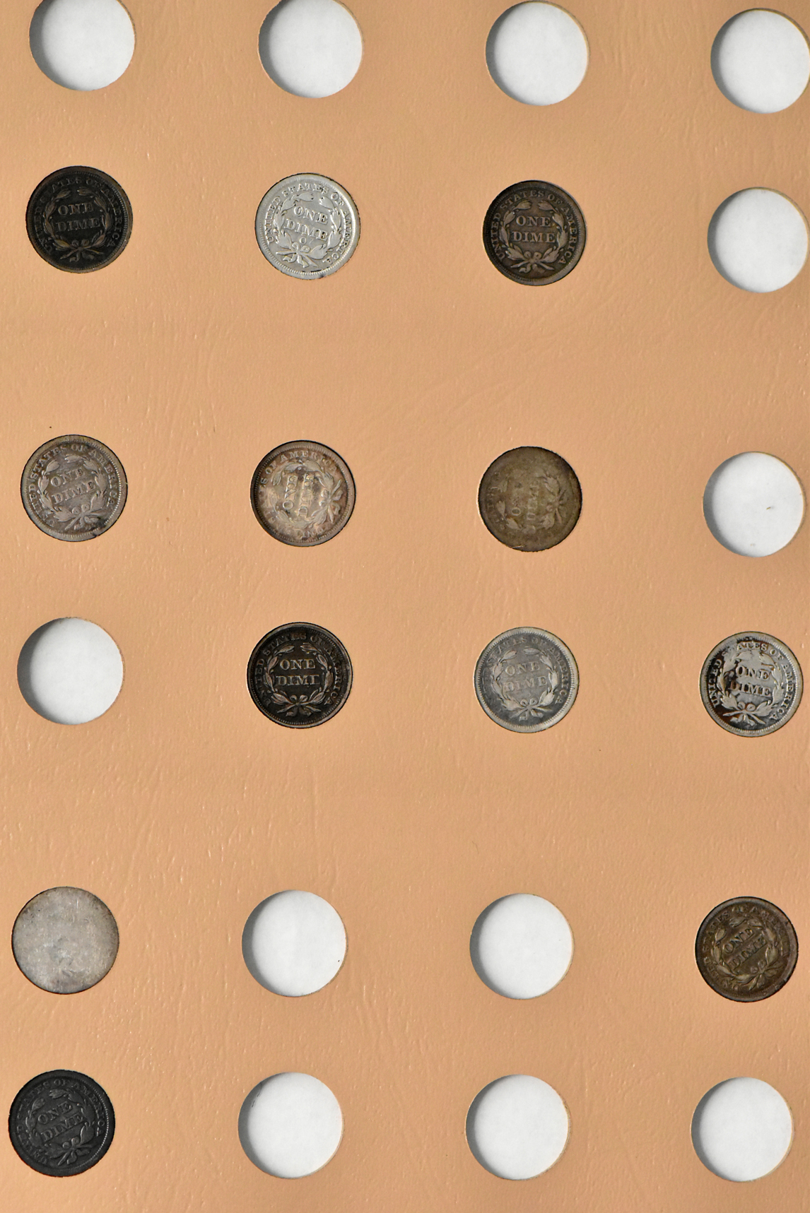 Collection of 61 Liberty Seated dimes in a Dansco 6122 album