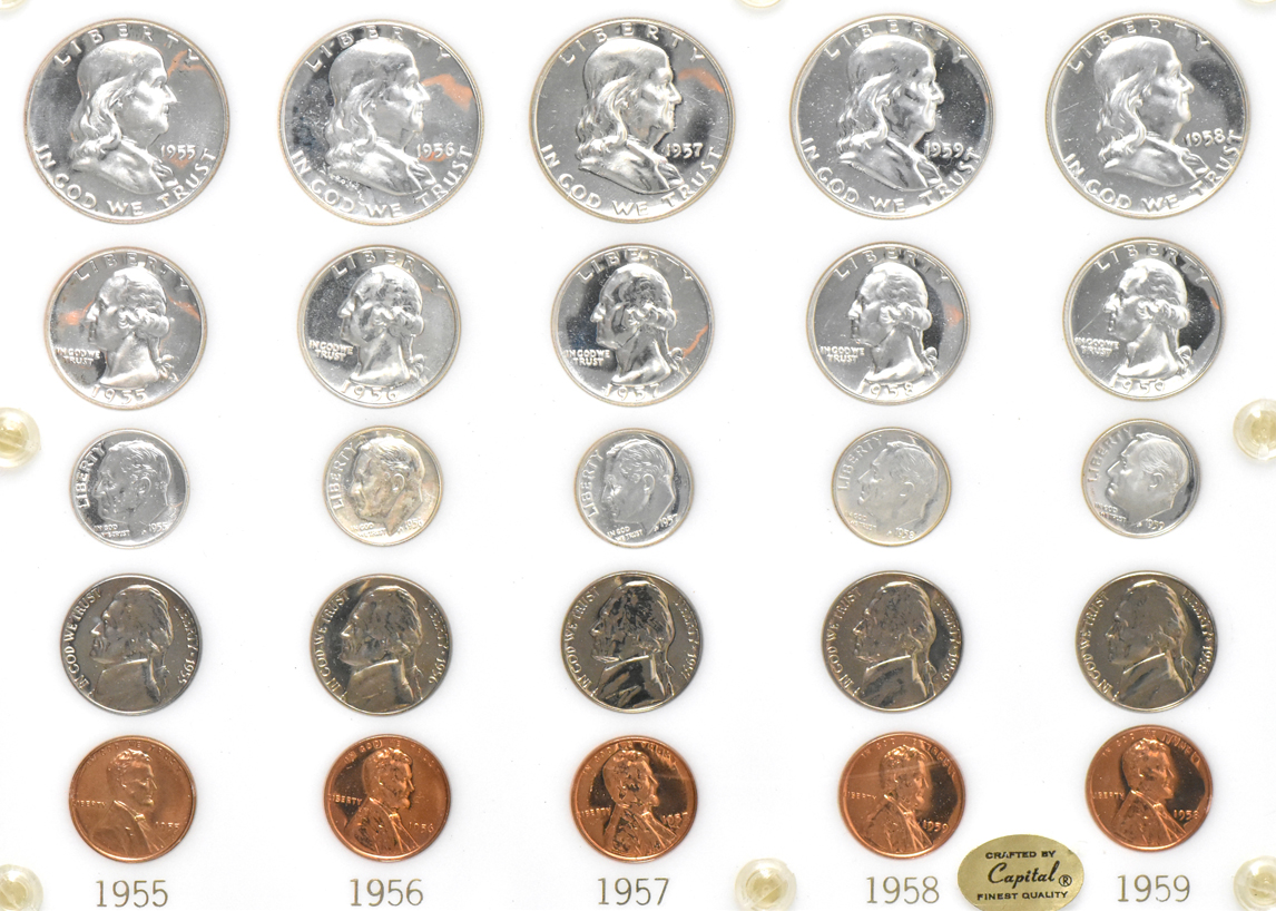 Fifteen Proof Sets, 1950 through 1963, including a small date cent set, in three Capital Plastics holders