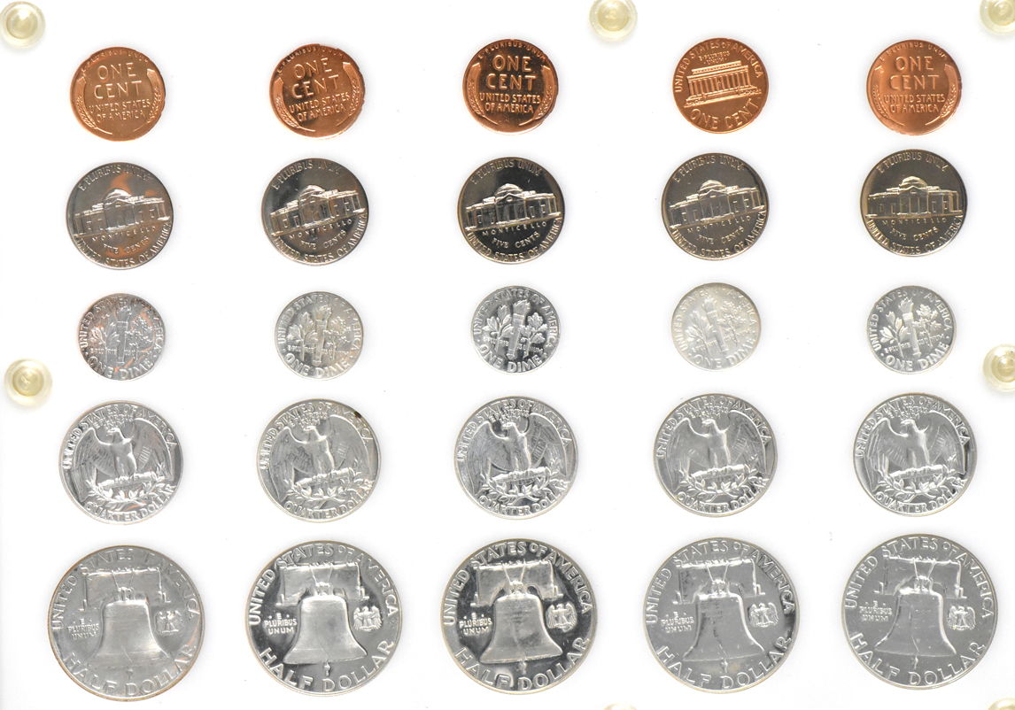 Fifteen Proof Sets, 1950 through 1963, including a small date cent set, in three Capital Plastics holders