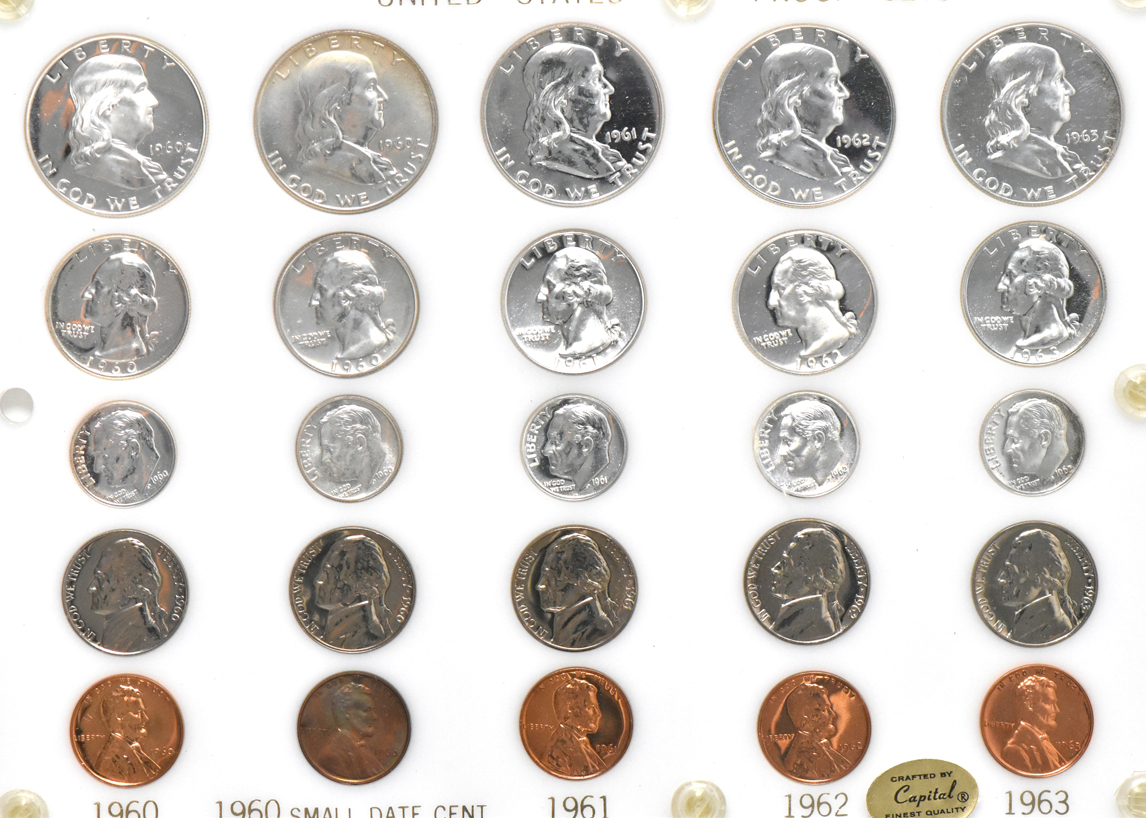Fifteen Proof Sets, 1950 through 1963, including a small date cent set, in three Capital Plastics holders