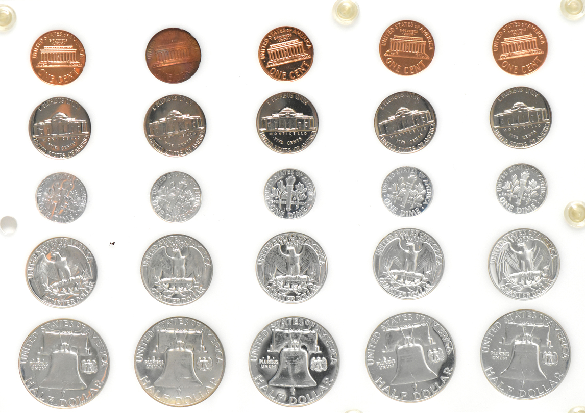 Fifteen Proof Sets, 1950 through 1963, including a small date cent set, in three Capital Plastics holders