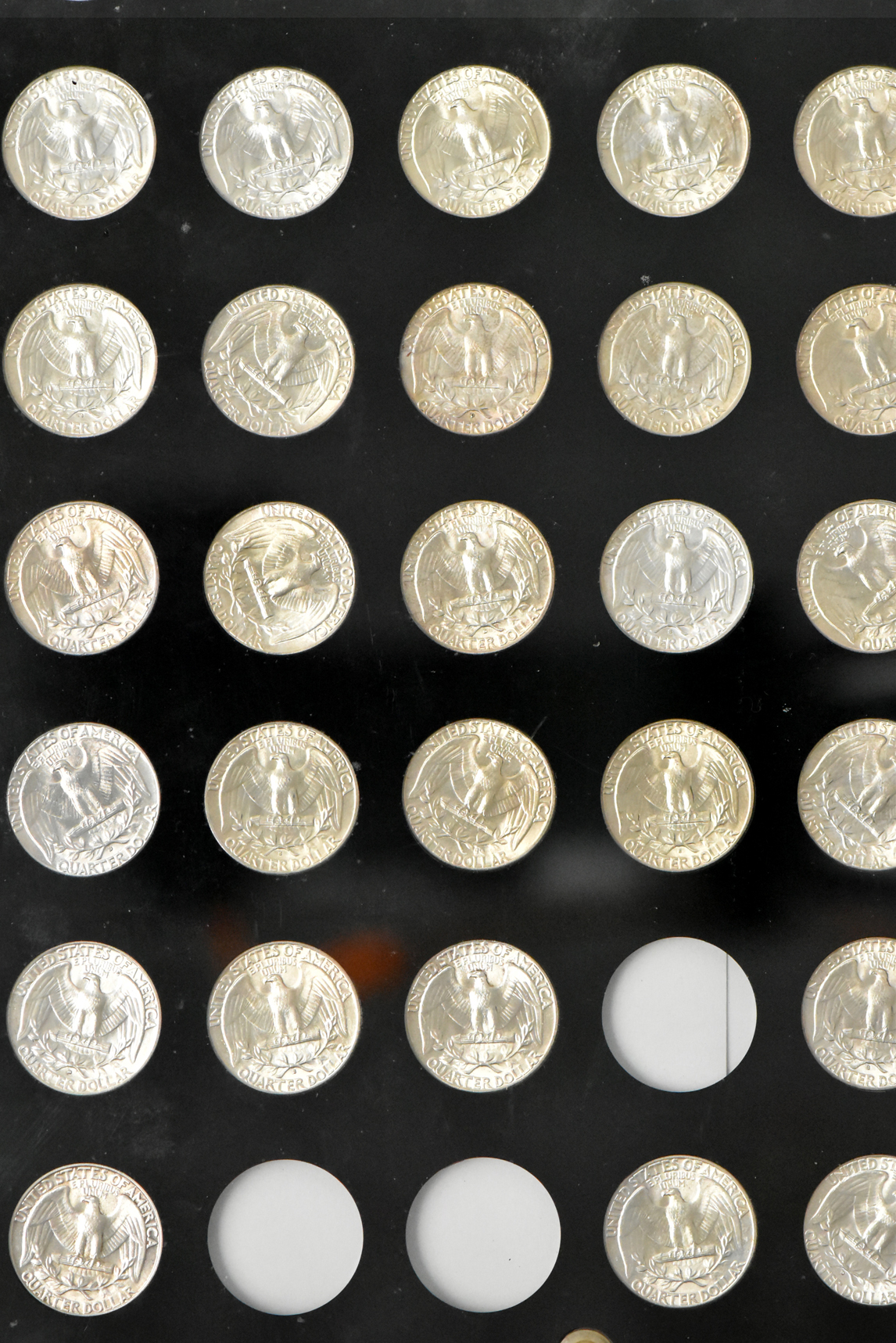 Collection of 39 different Washington quarter in a Capital Plastics holder