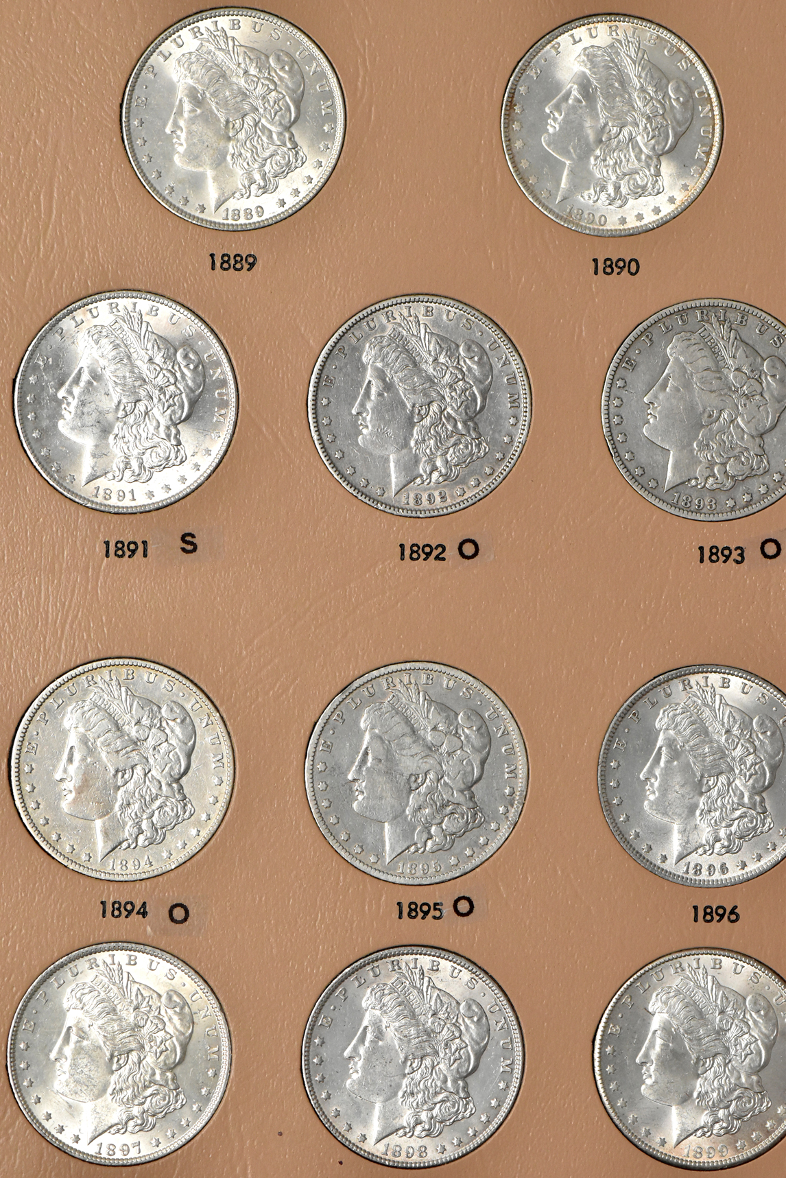 Complete 32 coin Morgan dollar date set in a Dansco 7171 album
