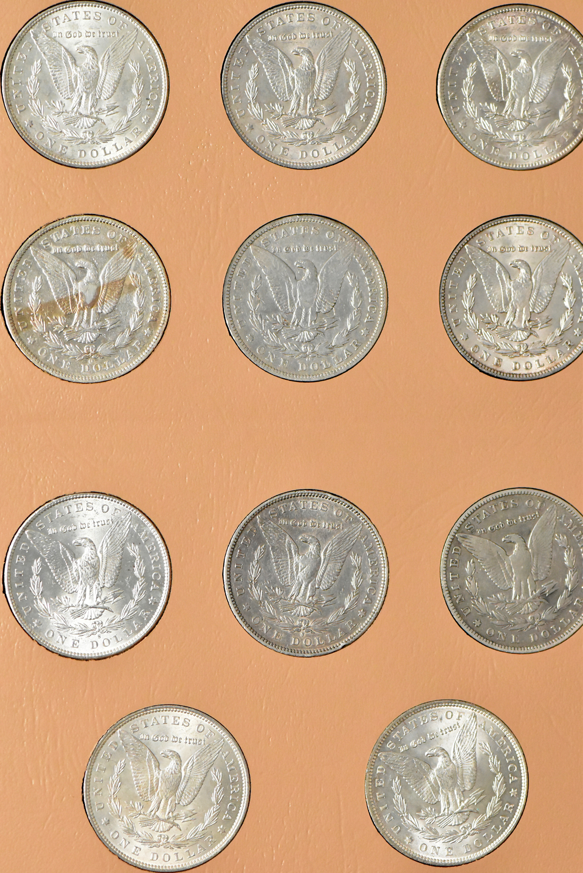 Complete 32 coin Morgan dollar date set in a Dansco 7171 album
