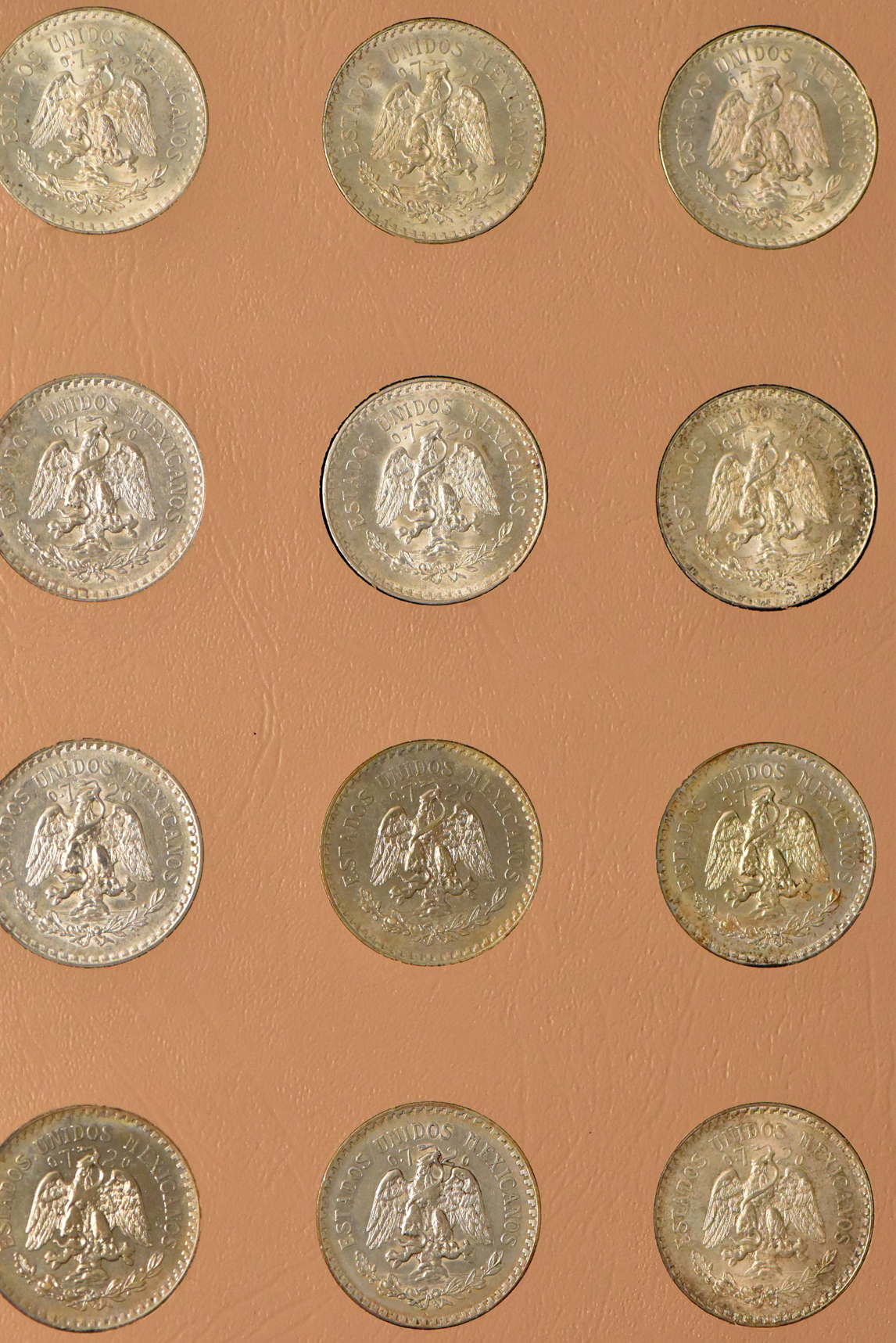 Mexico - Collection of 52 different 1 peso coins in a Dansco album