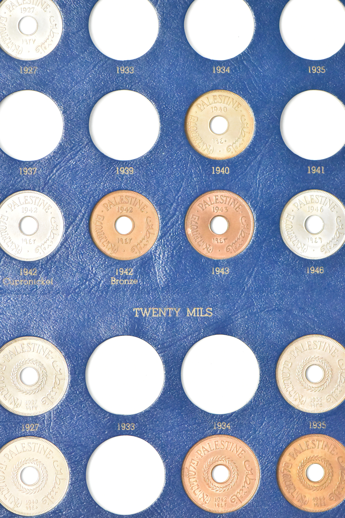 Palestine - Collection of 42 British Mandate Coins in a blue Dansco P-100 album