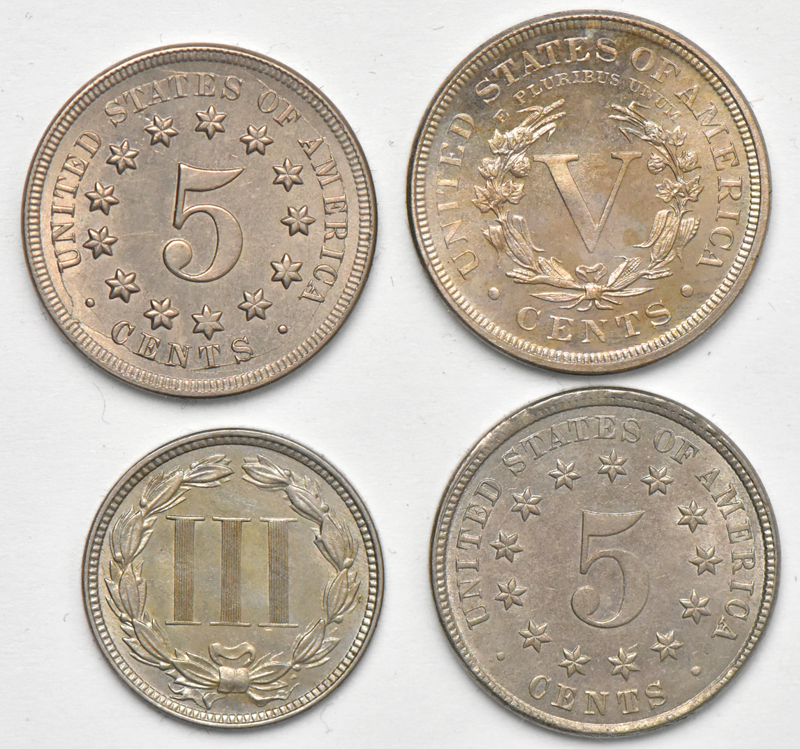 A three-cent Nickel, two Shield nickels, and a Proof Liberty nickel 