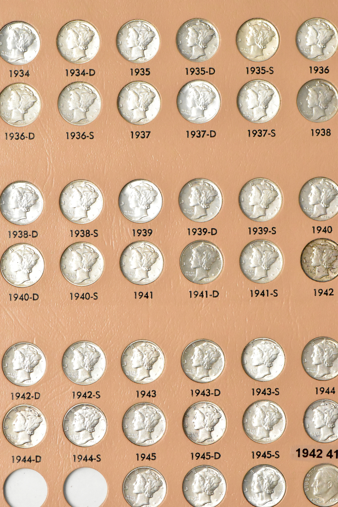 Collections of Mercury dimes and Roosevelt dimes in a Dansco album