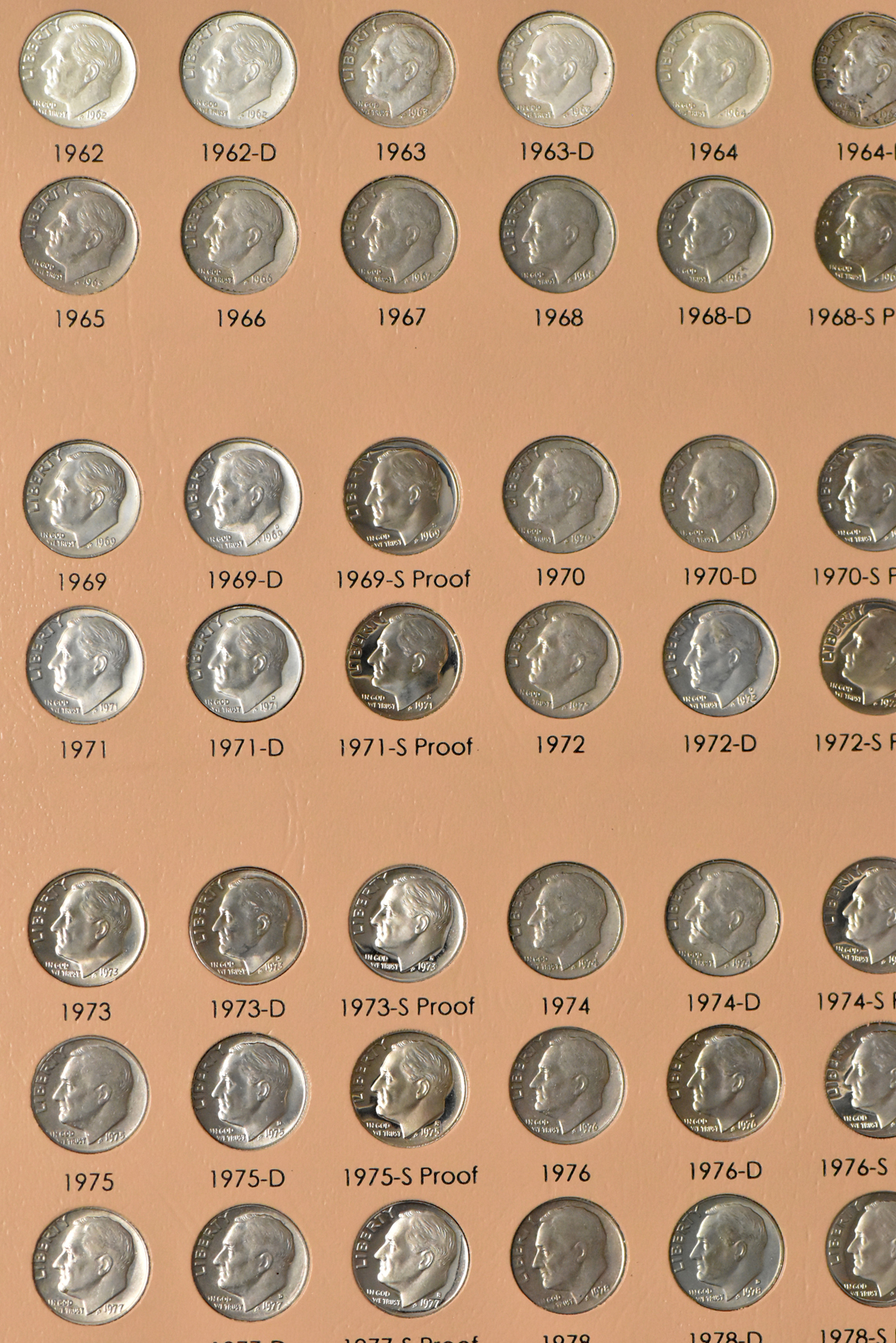 Collections of Mercury dimes and Roosevelt dimes in a Dansco album