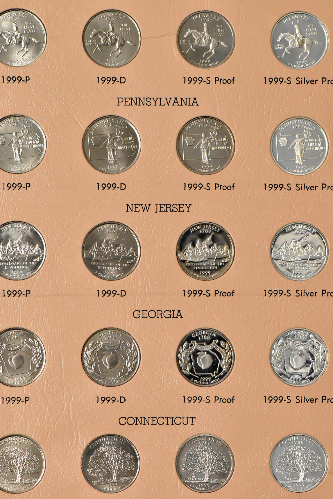 Collection of Washington quarters in five Dansco albums