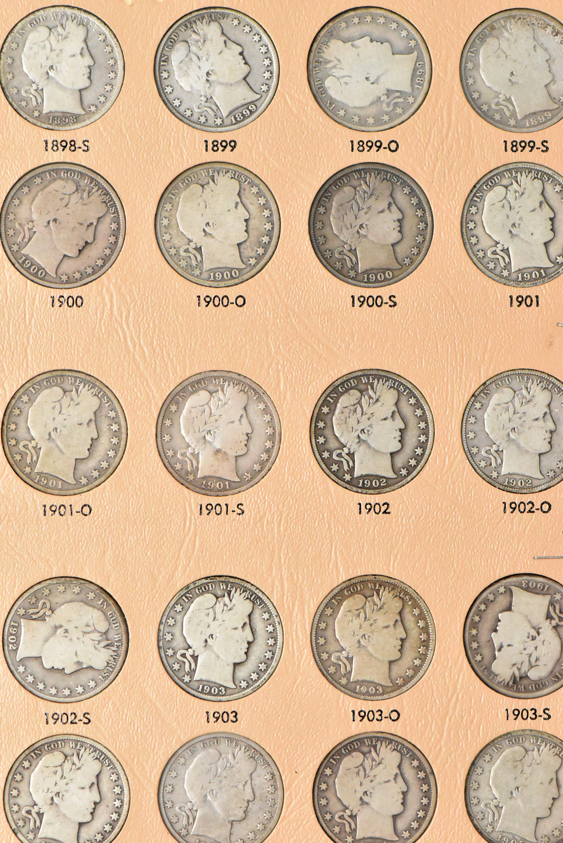Collection of Barber half dollars in a complete Dansco 7150 album