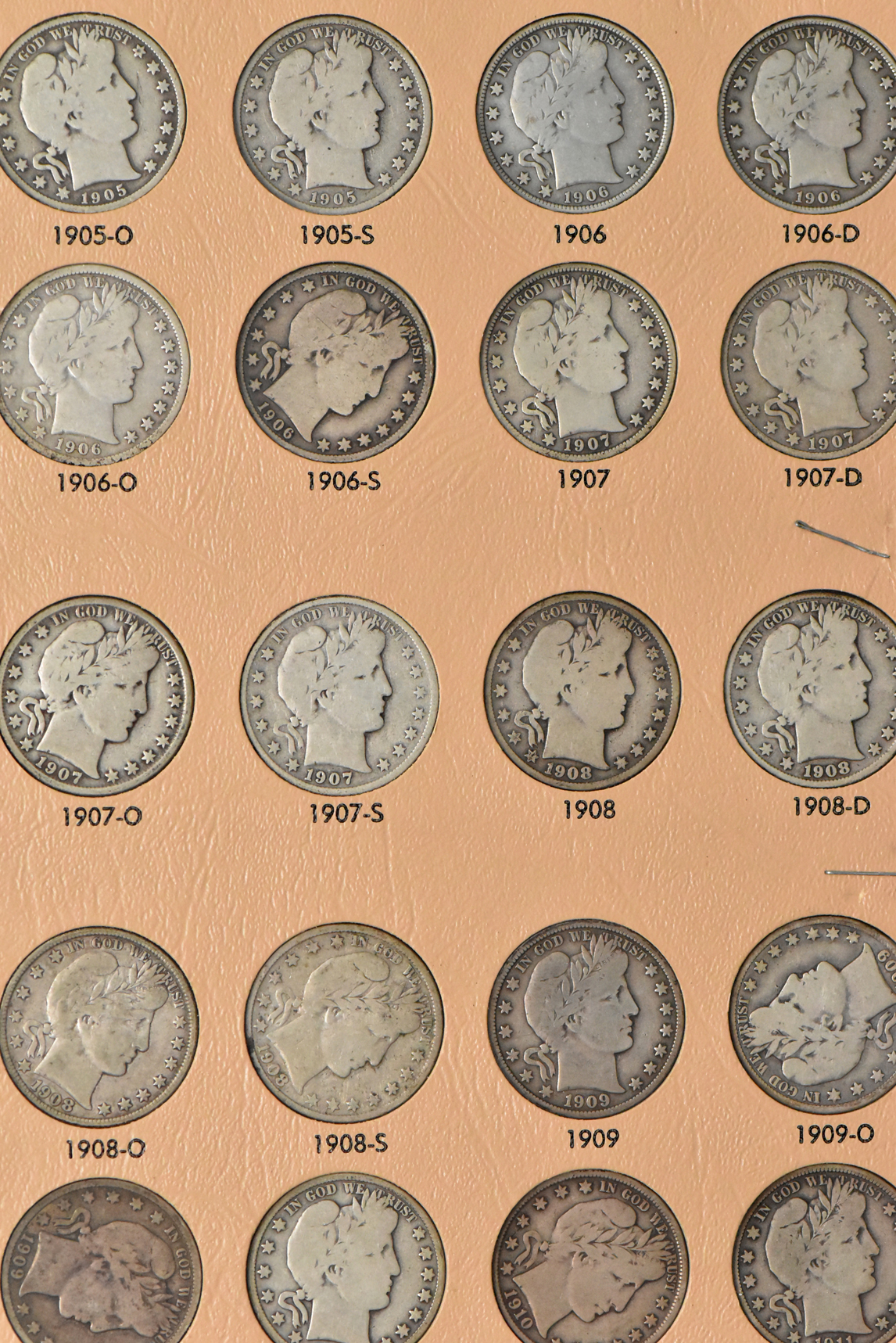 Collection of Barber half dollars in a complete Dansco 7150 album