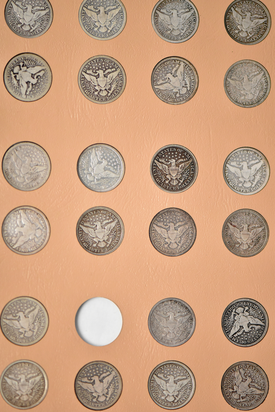 Collection of Barber quarters in a complete Dansco 7130 album