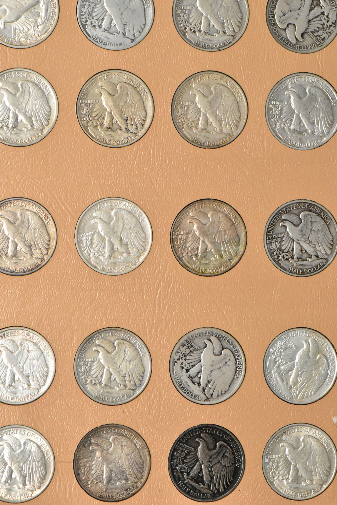Collection of Walking Liberty half dollars in a complete Dansco 7160 album