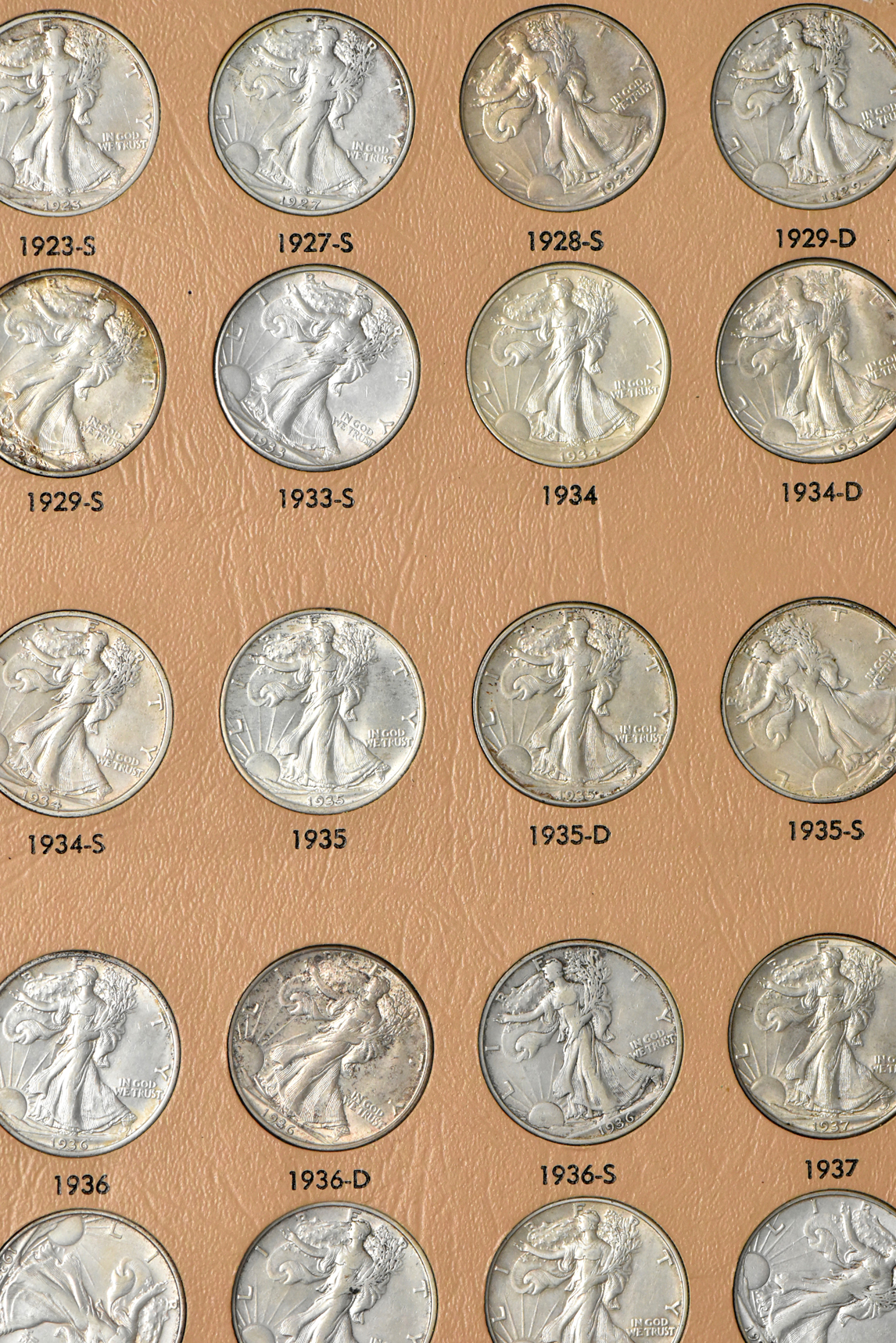 Collection of Walking Liberty half dollars in a complete Dansco 7160 album