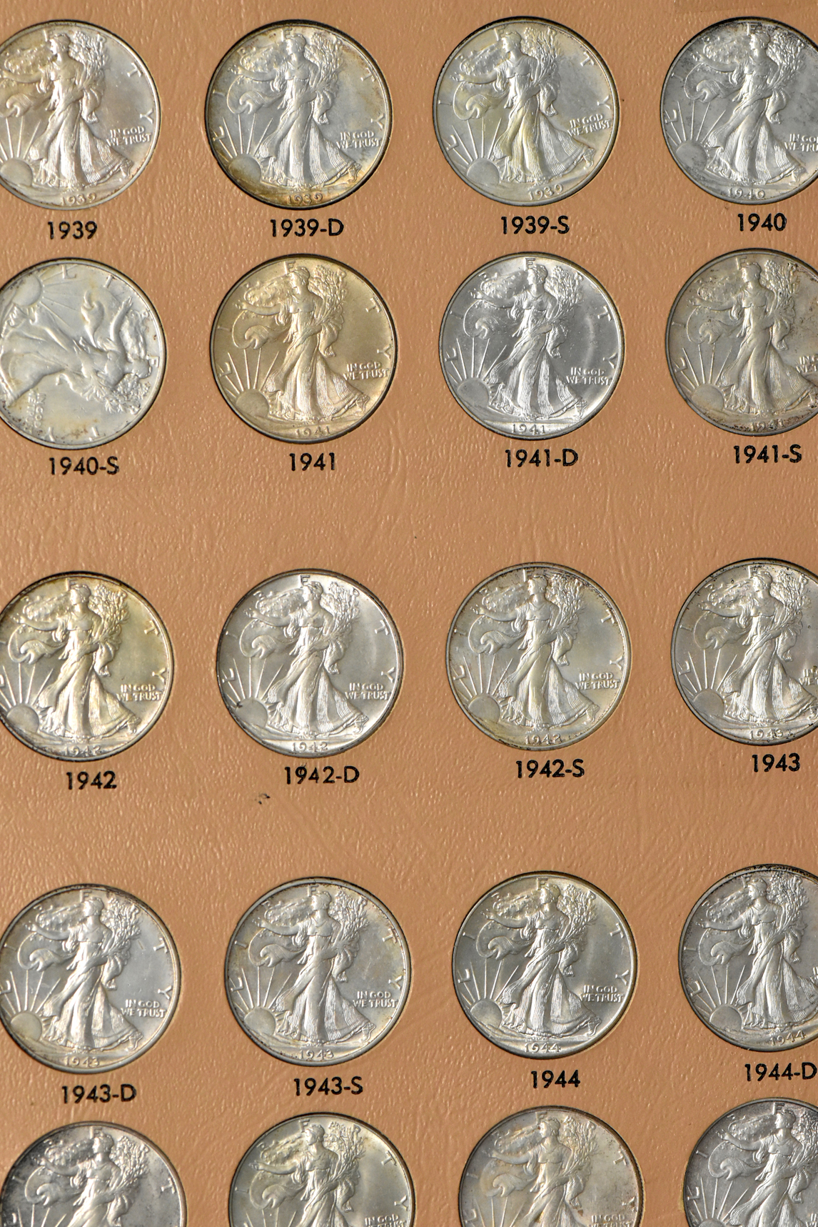 Collection of Walking Liberty half dollars in a complete Dansco 7160 album