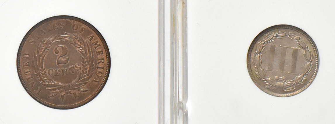 A two-cent piece and four three-cent pieces, as described