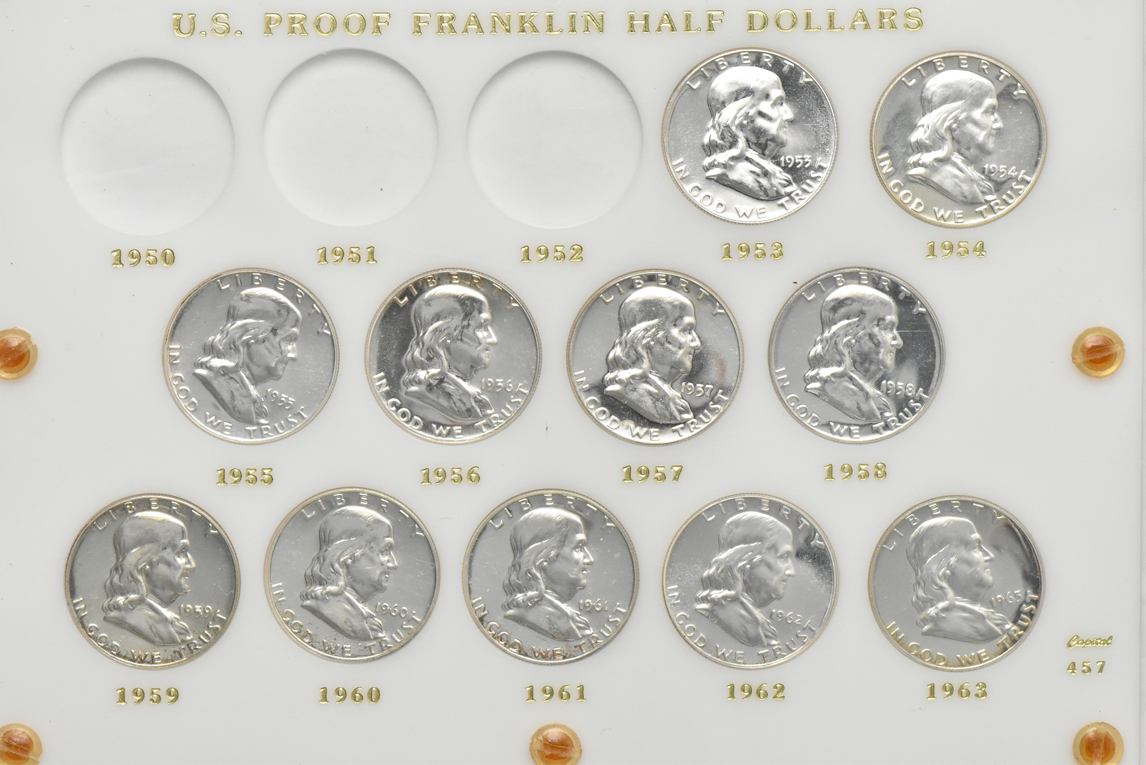 Group of Proof silver Washington quarters and Franklin half dollars in two Capital Plastics holders
