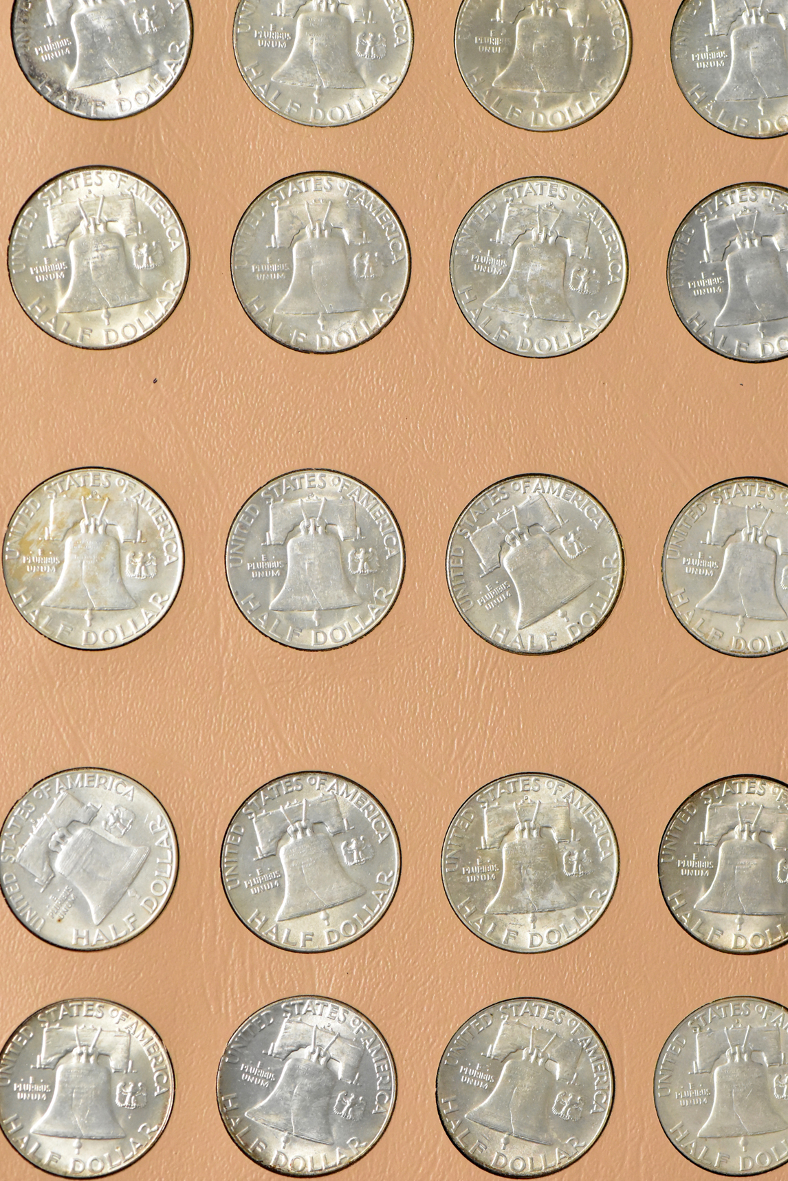 Collection of Franklin half dollars in a complete Dansco 7165 album (plus an additional 1963 and three 1964 Kennedy half dollars)
