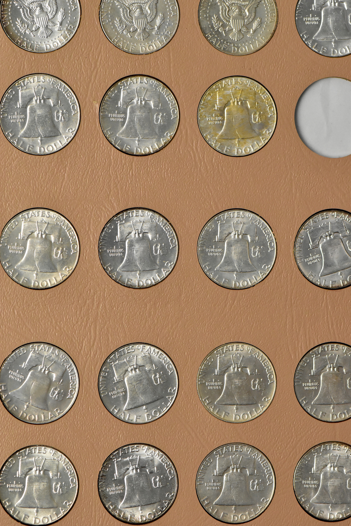 Collection of Franklin half dollars in a complete Dansco 7165 album (plus an additional 1963 and three 1964 Kennedy half dollars)
