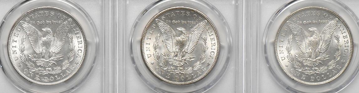 1879-O MS-64, 1897-S MS-64, and a 1904 MS-63, all PCGS