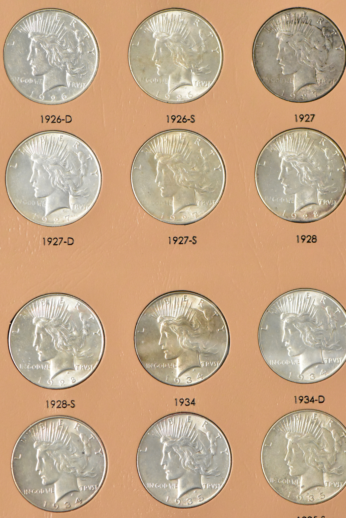 Collection of Peace dollars in a complete Dansco 7175 album