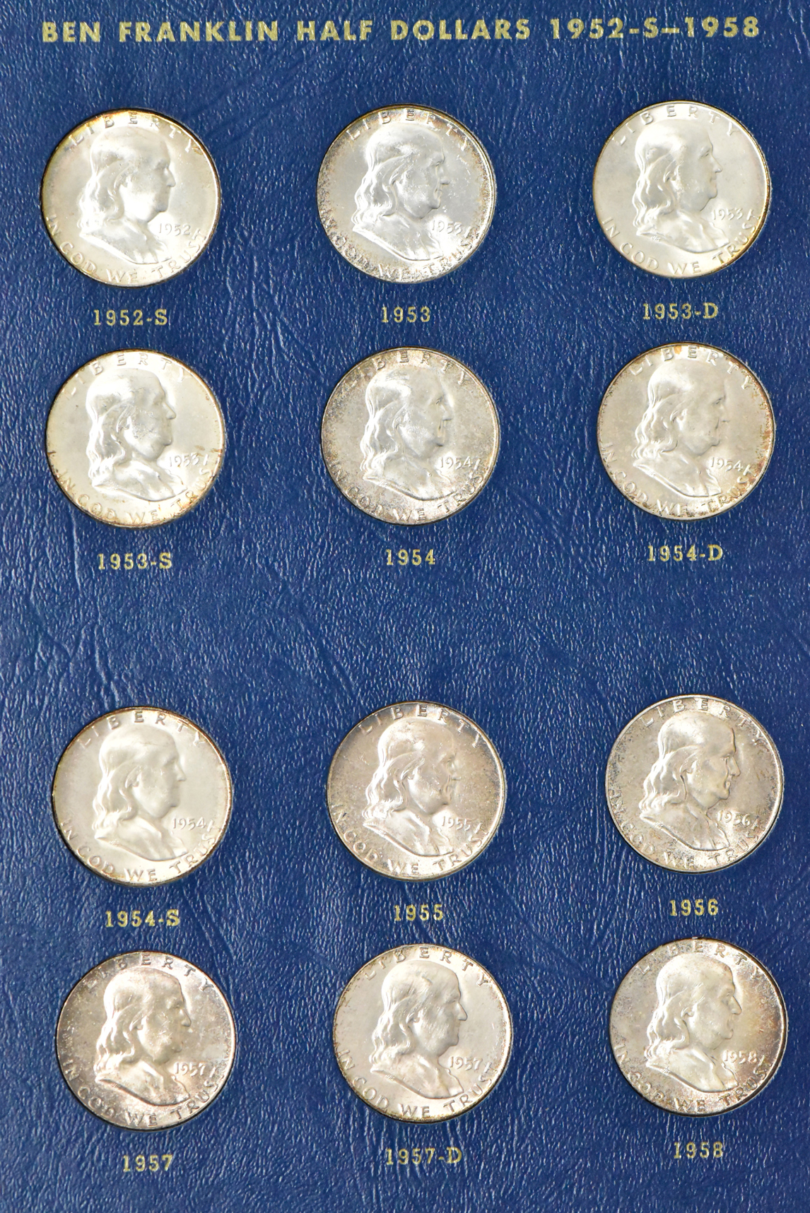 Collection of Franklin half dollars in a complete Whitman 9425 album