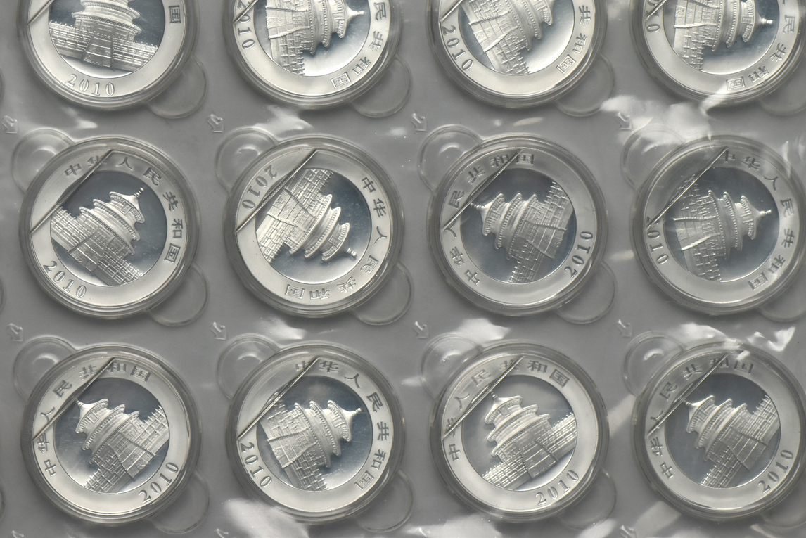 China - Fifty-four 2010 1oz silver Panda 10 yuan in capsules
