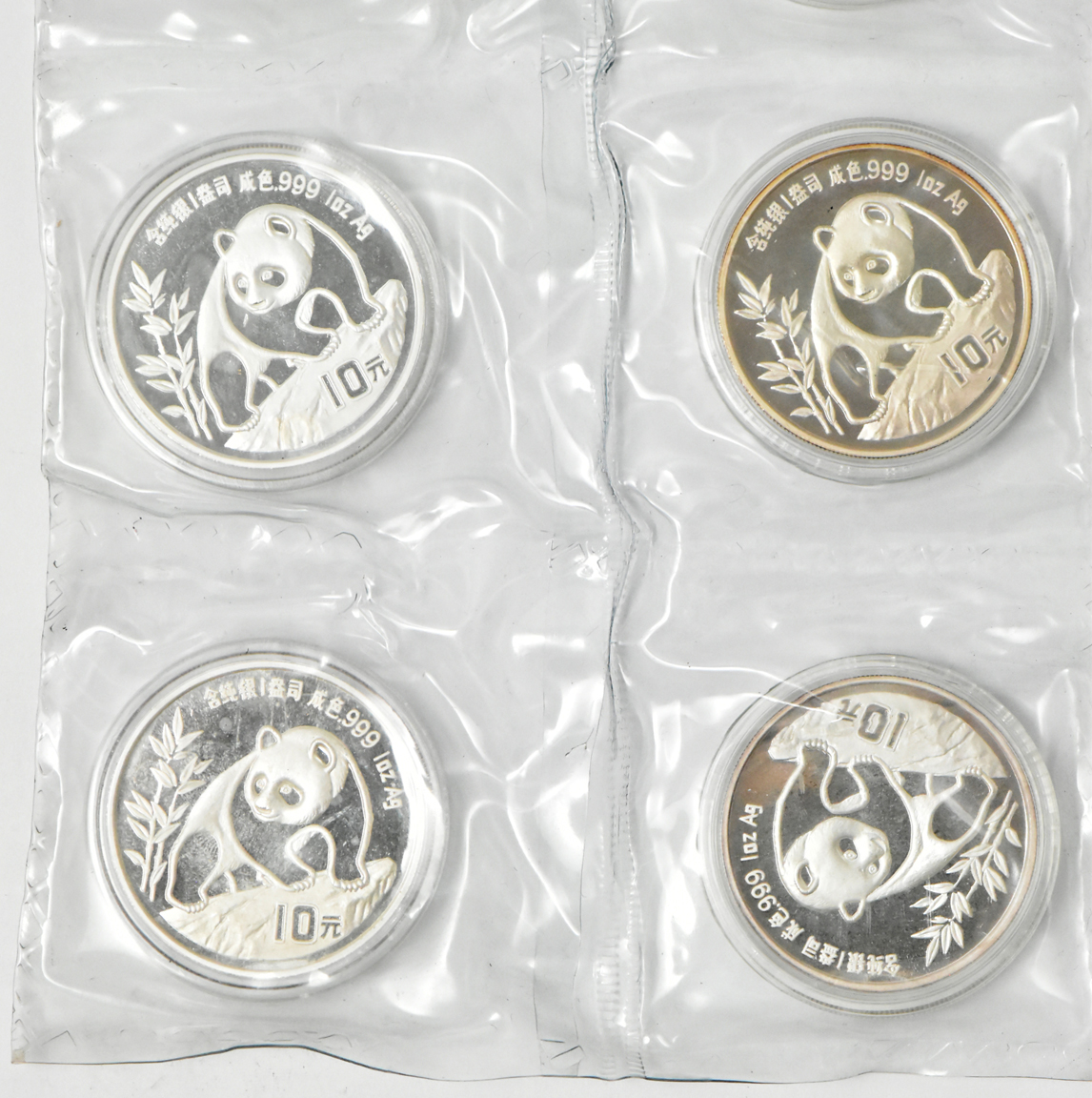 China - Uncut sheet of ten 1990 sm. date 1oz silver Panda 10 yuan
