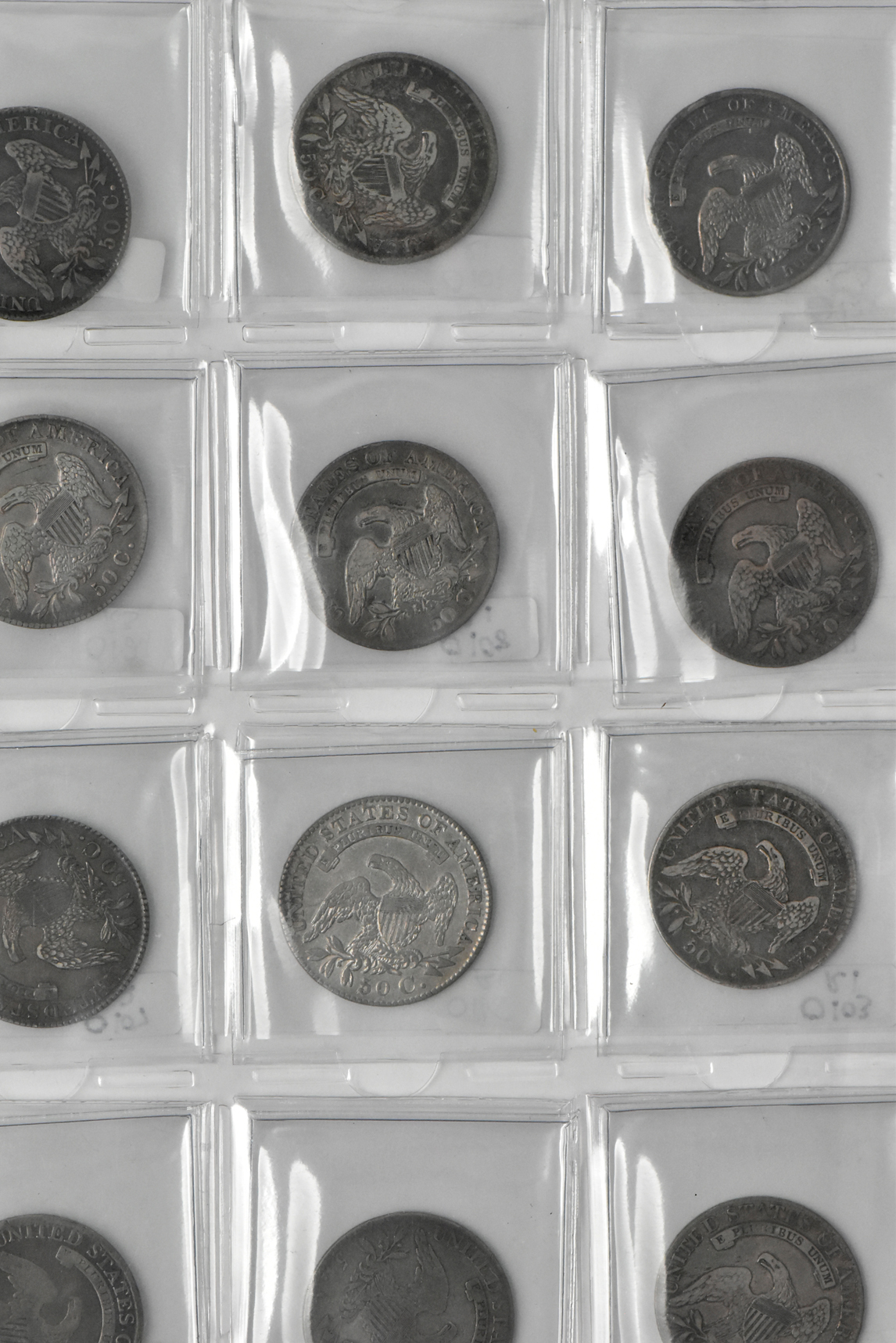 Collection of 31 Capped Bust half dollars